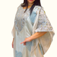 Side view showcasing the luxurious sheen of the full-length Armani silk inner beneath the blue mul cotton overlay on other side view