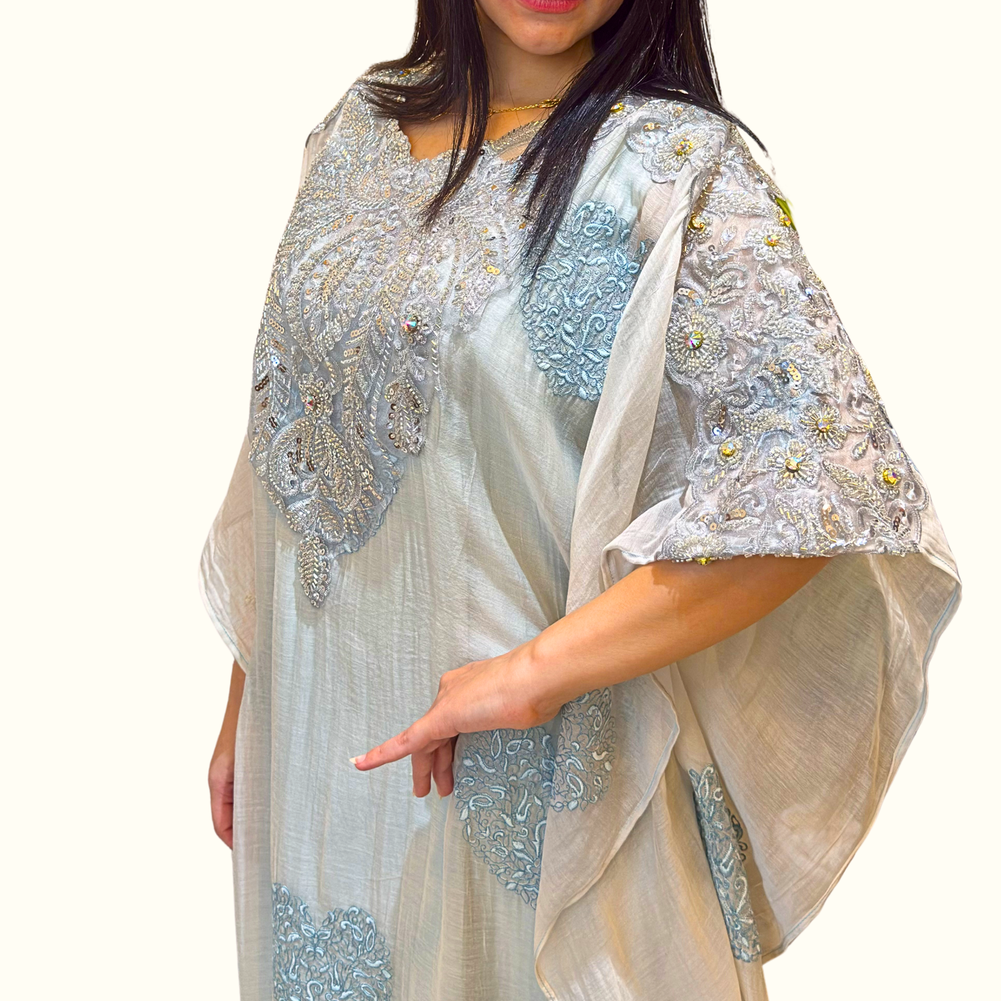 Side view showcasing the luxurious sheen of the full-length Armani silk inner beneath the blue mul cotton overlay on other side view