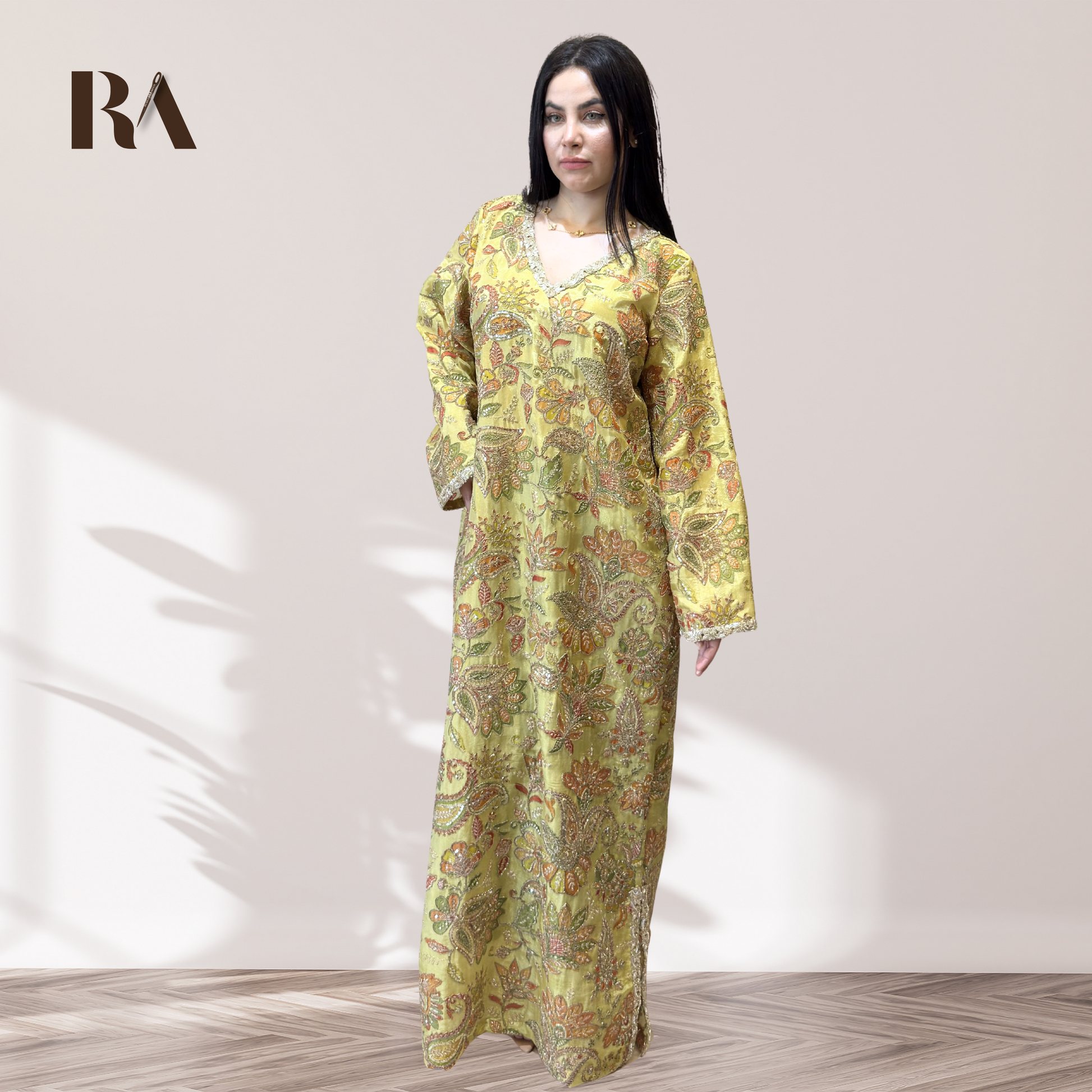 Rubeena Ameen elegant pista green tissue silk maxi dress featuring multi-color floral motifs