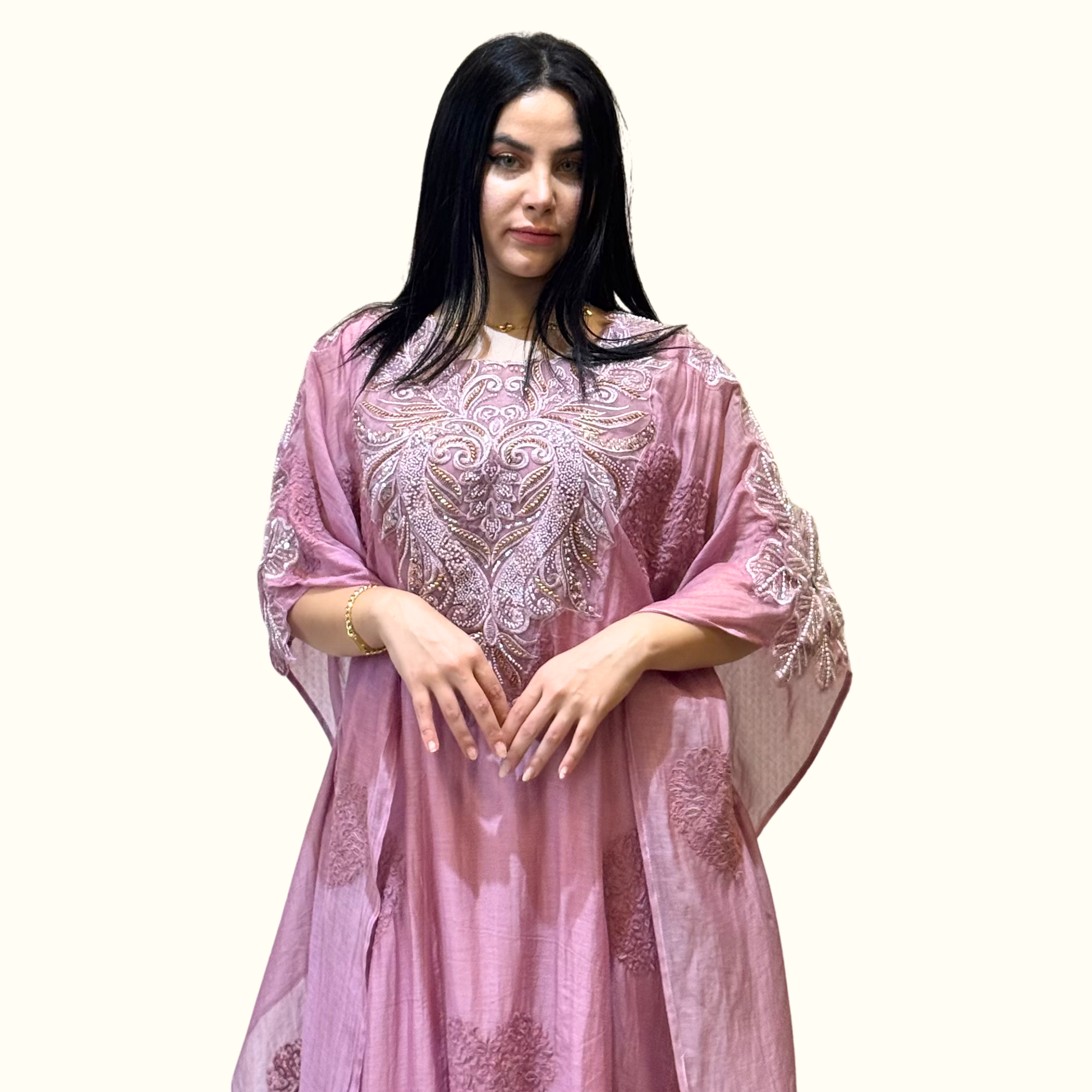 Close-up of detailed white embroidery and textured heart motifs on Rubeena Ameen mauve cotton kaftan