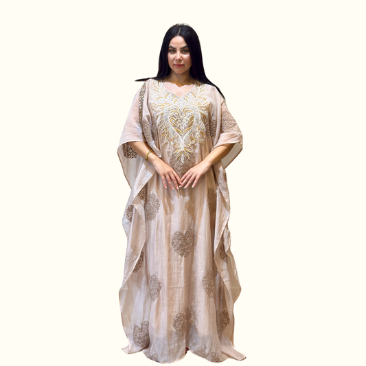 Front view of Rubeena Ameen elegant ivory off-white mul cotton kaftan set with heavy neck embroidery