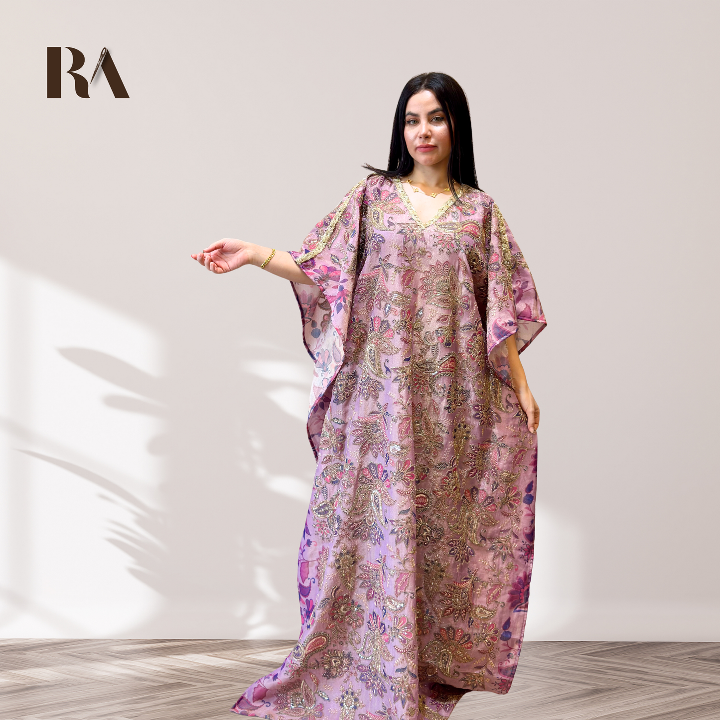 woman wearing lavenderi zari kaftan with embroidery allover
