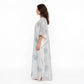 Model wearing a mul cotton two pice kaftan with side angle shown 