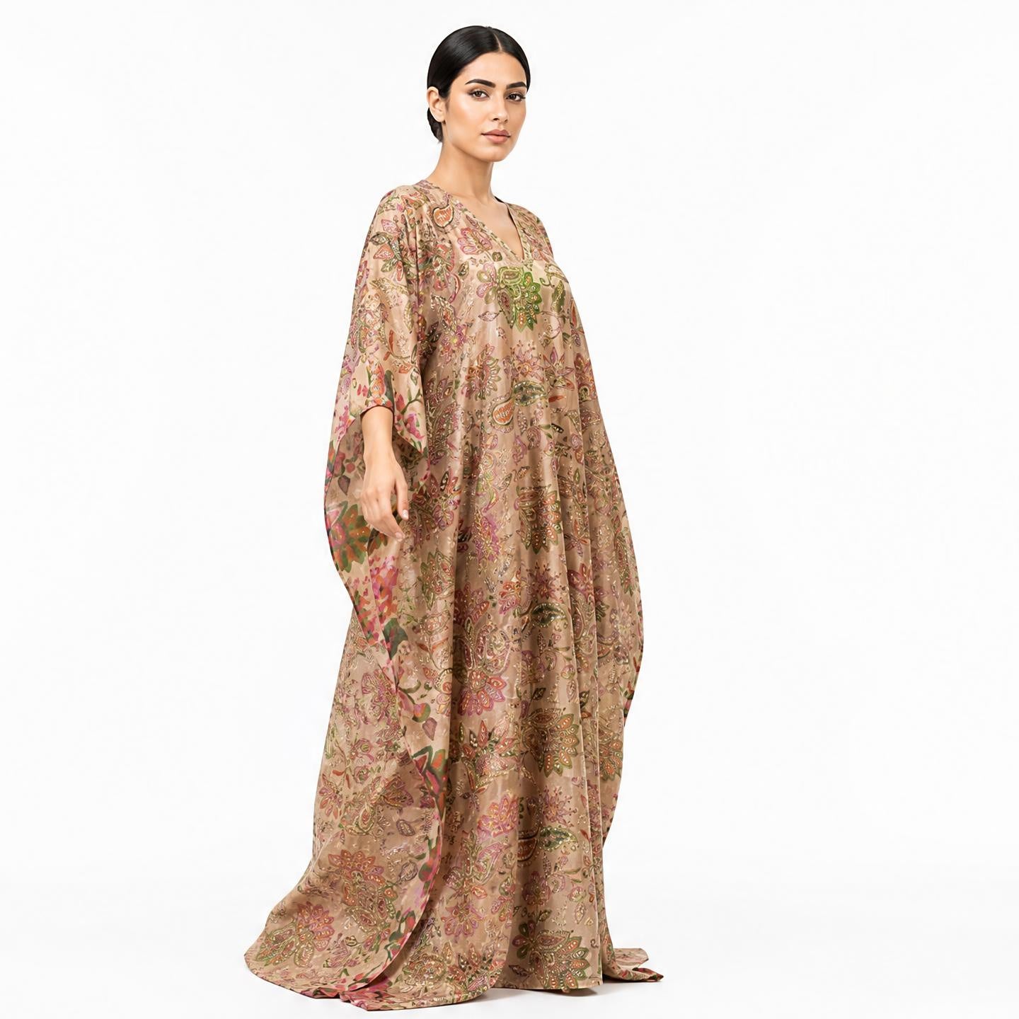 Gold tissue silk kaftan dress with sequin paisley embroidery, 3/4 side angle