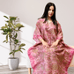 Close-up of the dense, intricate multi-color floral embroidery work on Rubeena Ameen pink luxury kaftan