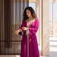 Close-up of the sleeve detailing on a vibrant magenta handmade Moroccan kaftan.