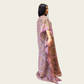 Side view showcasing the fluid drape and wide, flowing sleeves of Rubeena Ameen mauve purple kaftan