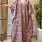 women wearing lavender zari tissue work kaftan and moving beautifully 