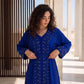 Close-up of the silver and crystal beaded embroidery and belt on a royal blue handmade Moroccan kaftan.